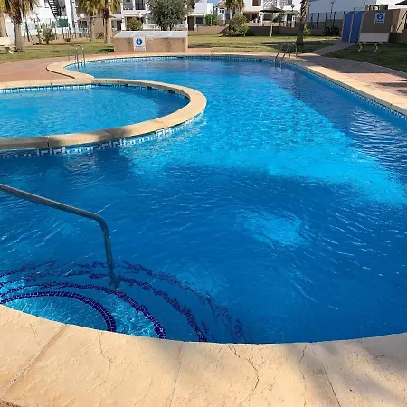 Holiday home Lovely 2-bed House In Punta Prima Costa