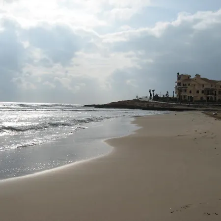 Holiday home Lovely 2-bed House In Punta Prima Costa *